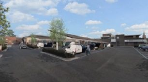 Afbeelding bij de poll: We stimuleren het toepassen van zonnepanelen in het centrum. Zonneluifels boven de parkeervakken bij Albert Heijn is een goede plaats hiervoor